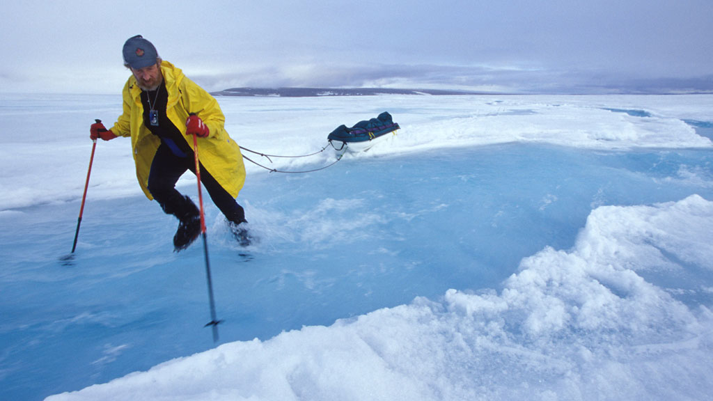 Crossing meltwater at 1000m elevation on the ice cap 